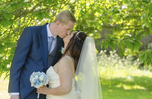 Wedding photographer catches happy couple